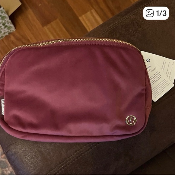 Handbags - Lululemon Burgundy Everywhere Belted Pouch NWT